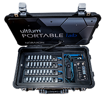 A portable lab case containing multiple rows of equipment, labeled 