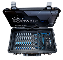 A portable lab case containing multiple rows of equipment, labeled 